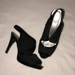All Black Heel with cutouts and a peep toe